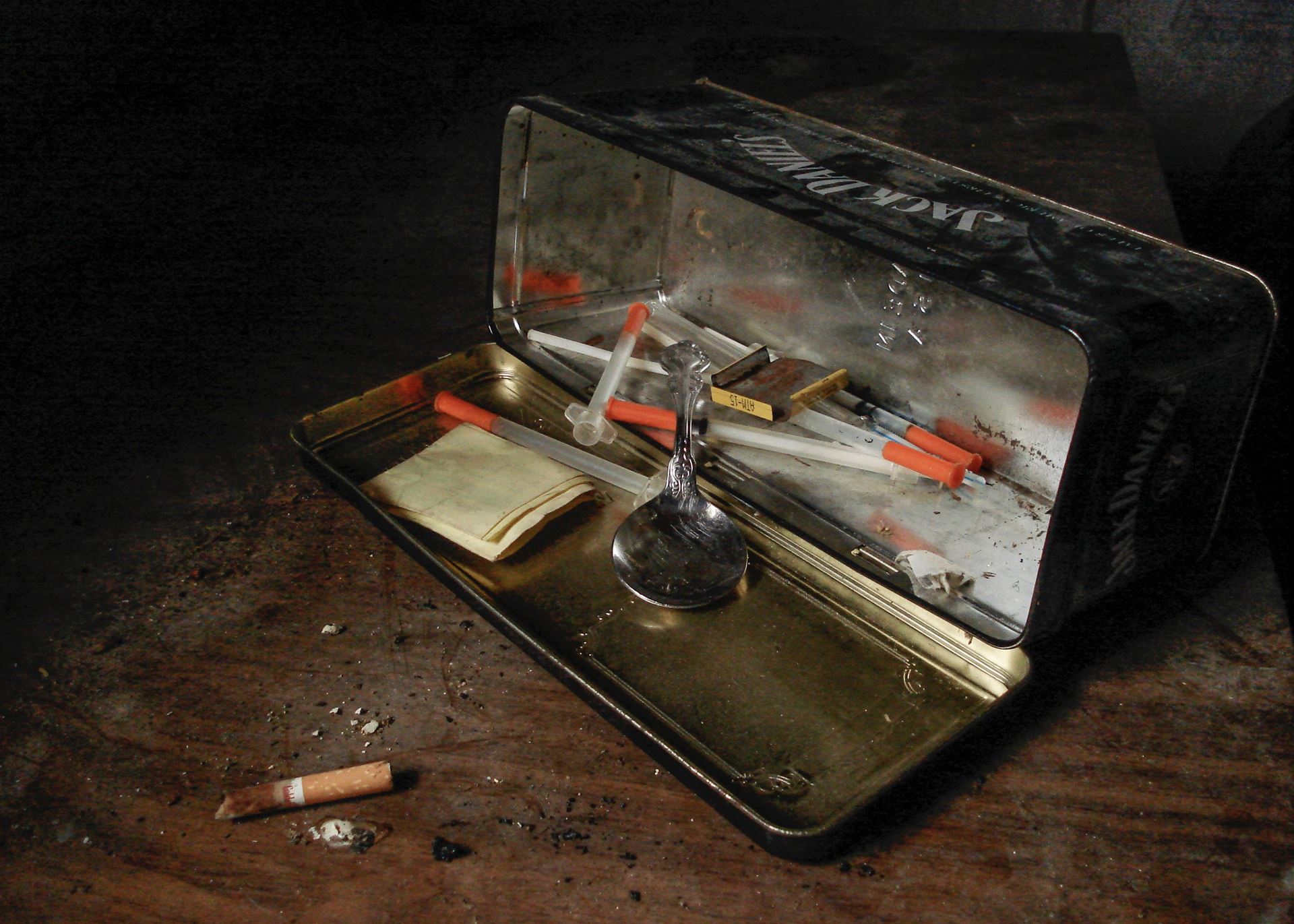 a piece of luggage sitting on top of a wooden table